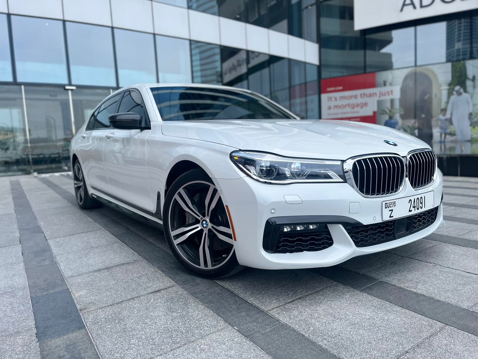 BMW 750i WHITE 2019 rental dubai