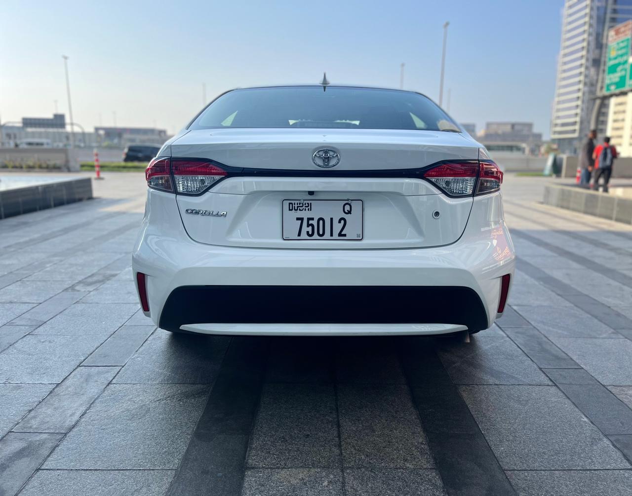 hire TOYOTA COROLLA WHITE 2021 in dubai